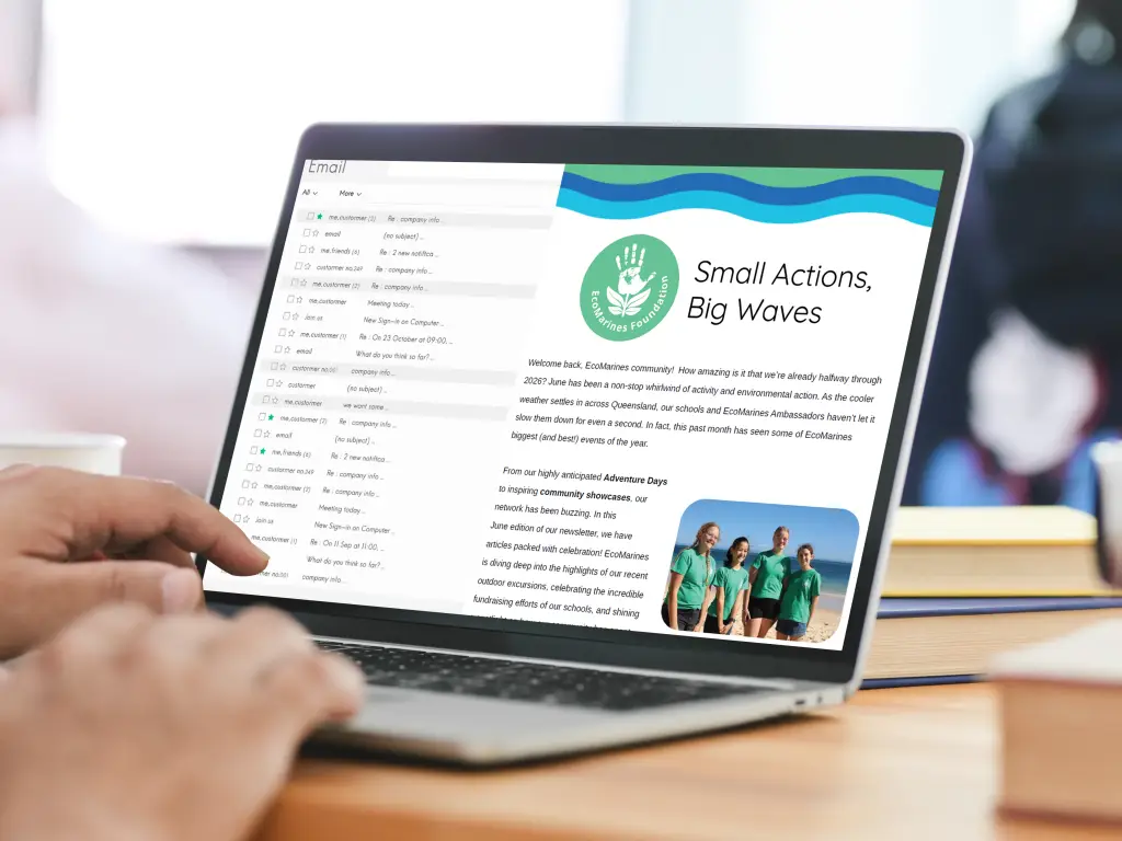 A laptop open to an email inbox, featuring one of EcoMarines Newsletters.